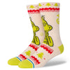 A pair of Stance Grinch sweater canvas socks with a whimsical character design and colorful patterns.