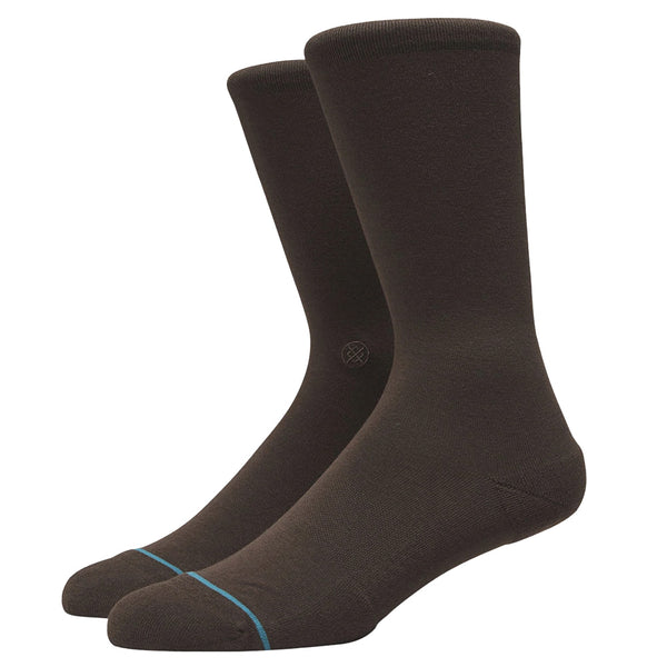A pair of brown STANCE SOCKS NATHAN BROWN LARGE with a blue accent on the toes and arch support.
