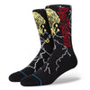A pair of black large Stance Night City socks, iron maiden-themed with band logo and mascot graphics.