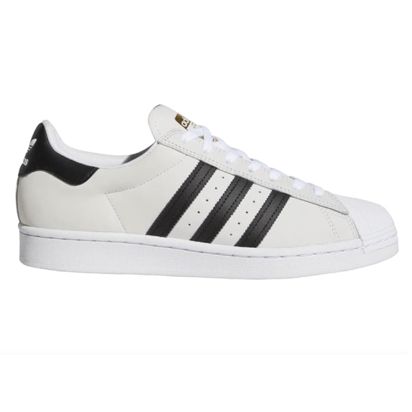 A pair of white and black ADIDAS SUPERSTAR ADV CLOUD WHITE / BLACK sneakers.