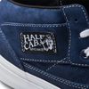 A pair of blue VANS SKATE HALF CAB DRESS BLUES shoes with a Half Cab logo on them.