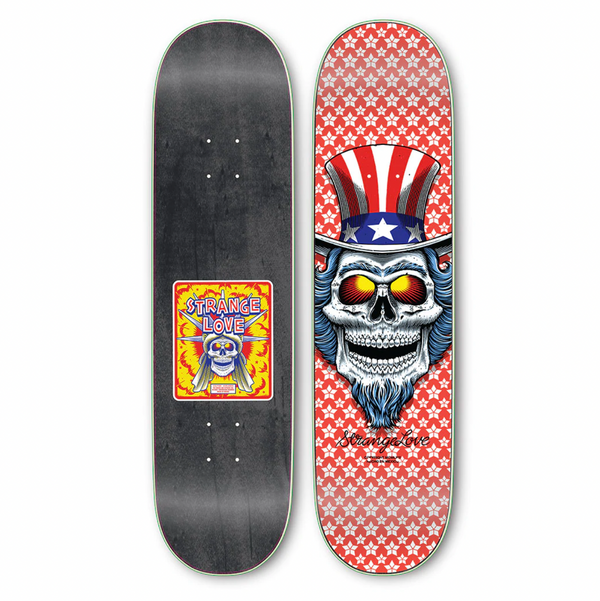 Two skateboard decks displayed side by side. One deck is the "STRANGE LOVE FIRECRACKER RED *SIGNED," featuring a graphic by Sean Cliver for STRANGELOVE, while the other deck, crafted by PS Stix, depicts a skull wearing an Uncle Sam hat with star patterns in the background.