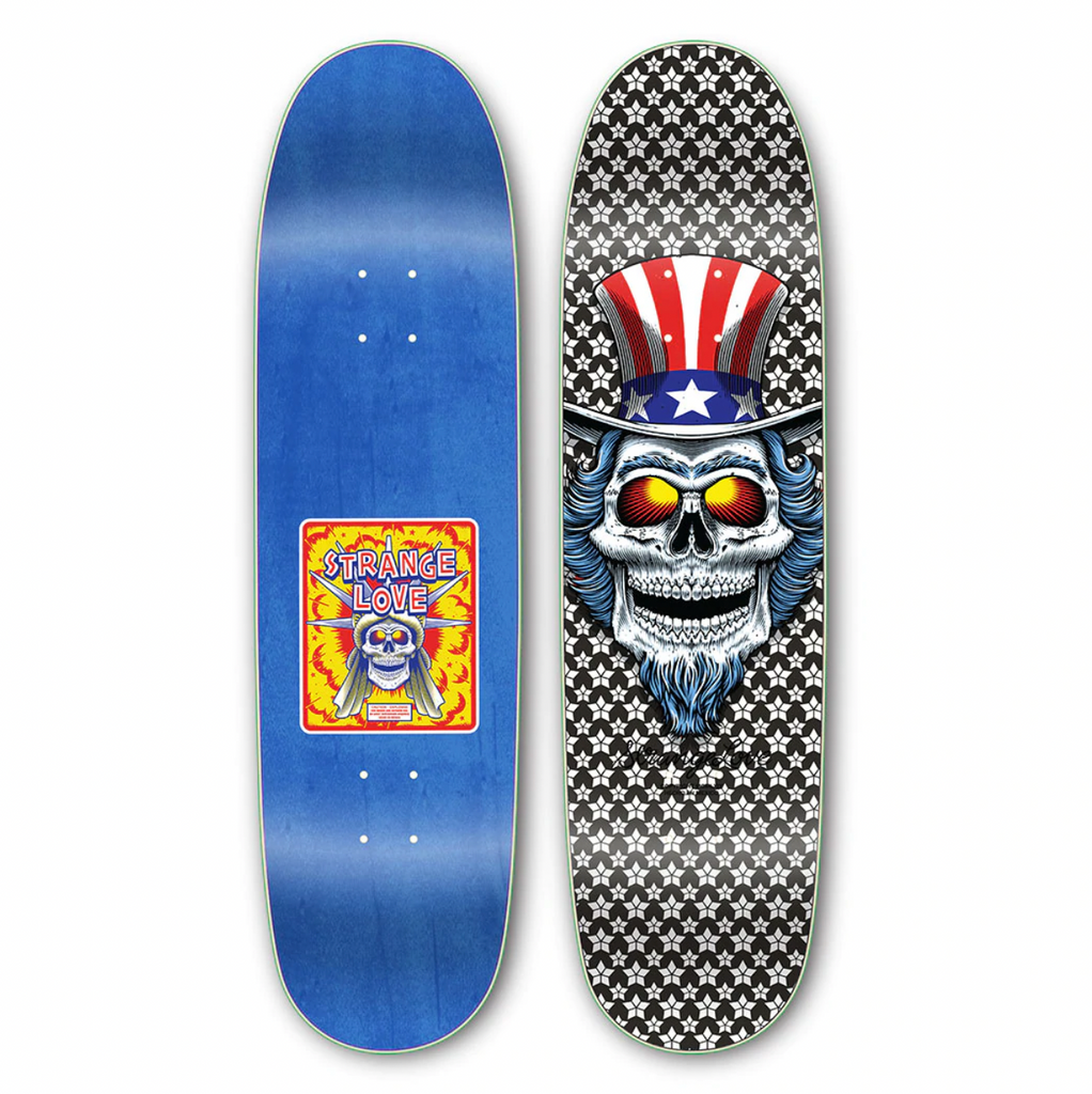 Two skateboard decks. The left deck, part of the STRANGE LOVE CODE BLUE series, features a "Strange Love" graphic by Sean Cliver. The right deck, called the STRANGE LOVE FIRECRACKER BLACK *SIGNED, is covered in star patterns with a skull wearing a patriotic top hat design, perfect for collectors when autographed.