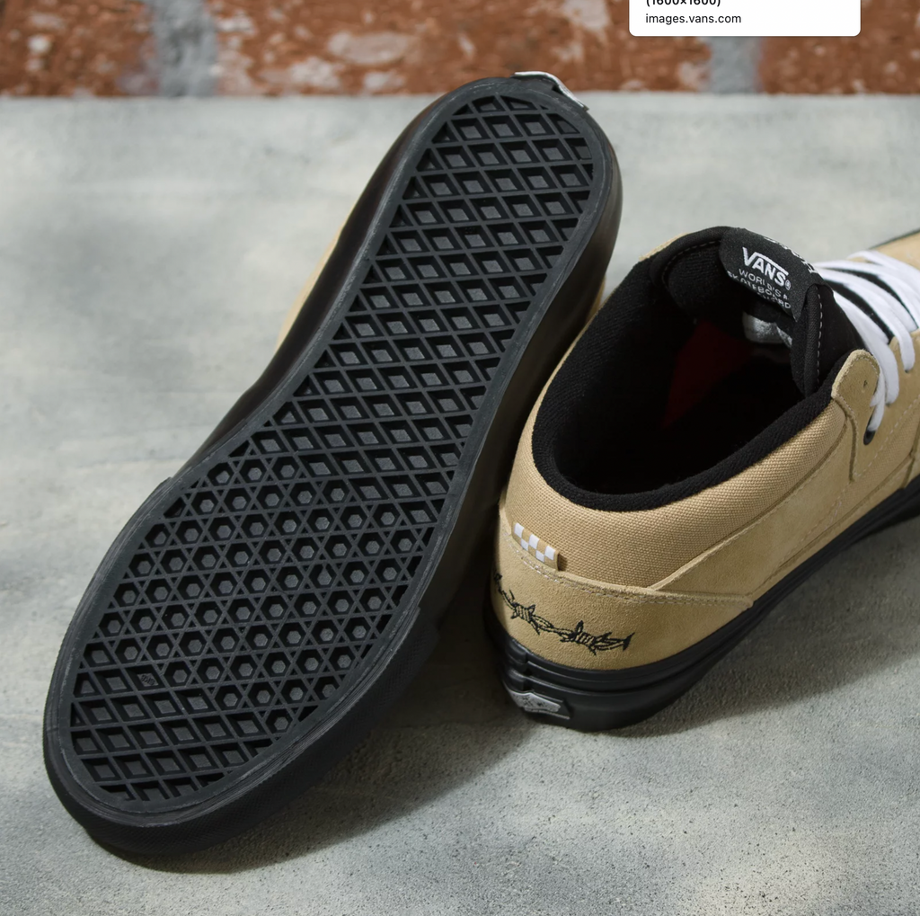 A pair of tan VANS ELIJAH BERLE SKATE HALF CAB BEIGE sneakers with black soles.