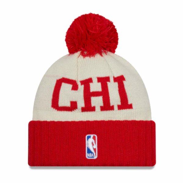 A red and white NEW ERA Chicago Bulls NBA Draft Pom Knit hat.