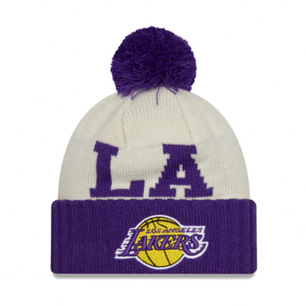 A New Era Los Angeles Lakers NBA Draft Pom Knit hat with the word "Lakers" on it.