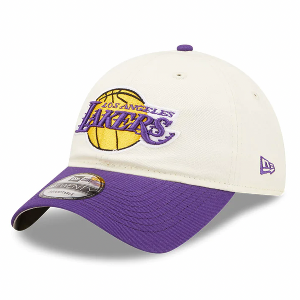 Introducing the NEW ERA LOS ANGELES LAKERS NBA DRAFT CAP, featuring a white crown and purple brim, proudly displaying the Los Angeles Lakers logo and a New Era sticker on the bill—perfect for celebrating your team's NBA Draft picks.