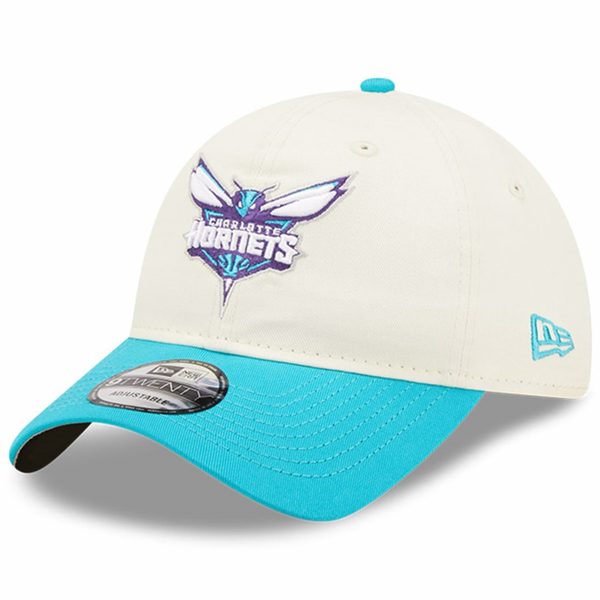 Introducing the NEW ERA CHARLOTTE HORNETS NBA DRAFT OSFM, a white and teal baseball cap featuring the Charlotte Hornets logo on the front. Perfect for celebrating your team's next NBA Draft pick, this cap also showcases the iconic New Era emblem on the side.