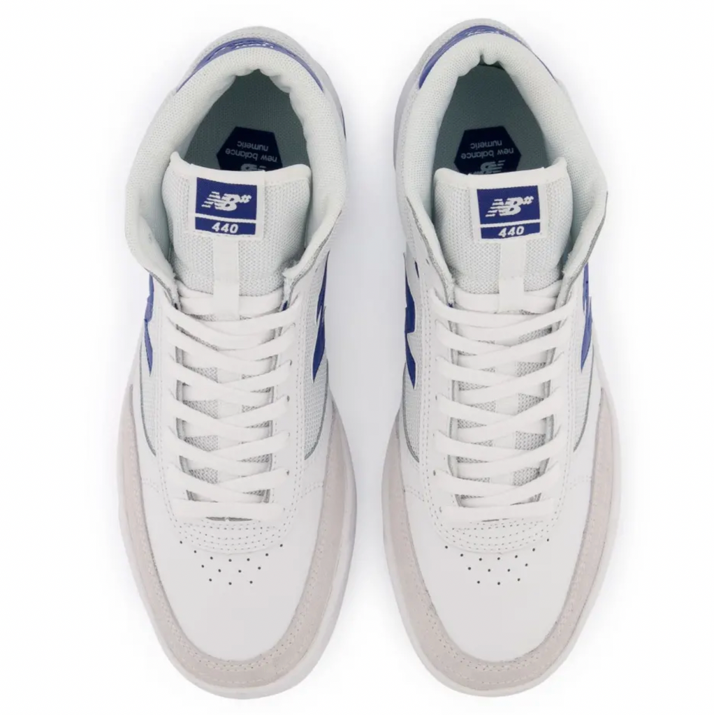 A pair of NB NUMERIC 440 White/Royal Blue sneakers on a white background.