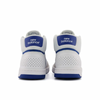 A pair of NB NUMERIC 440 White / Royal Blue shoes on a white background.