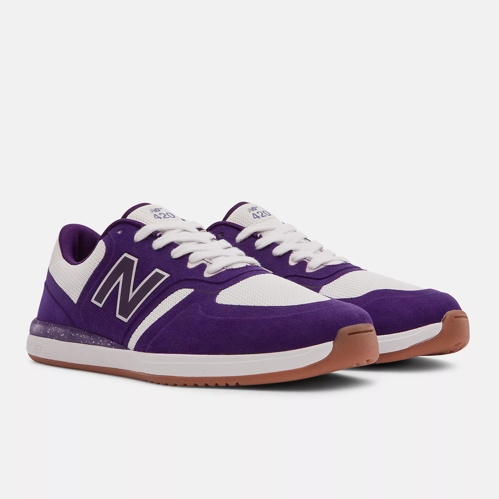 A NB Numeric 420 Purple/White shoes on a white background.