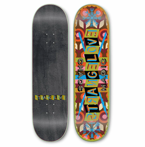 Two skateboard decks: the one on the left is plain black with "Strangelove" written in small text, while the one on the right features a vibrant, colorful design showcasing "Strange Love Aaron Rose Chaos Magic." These designs embody the distinct artistic vision of Aaron Rose.