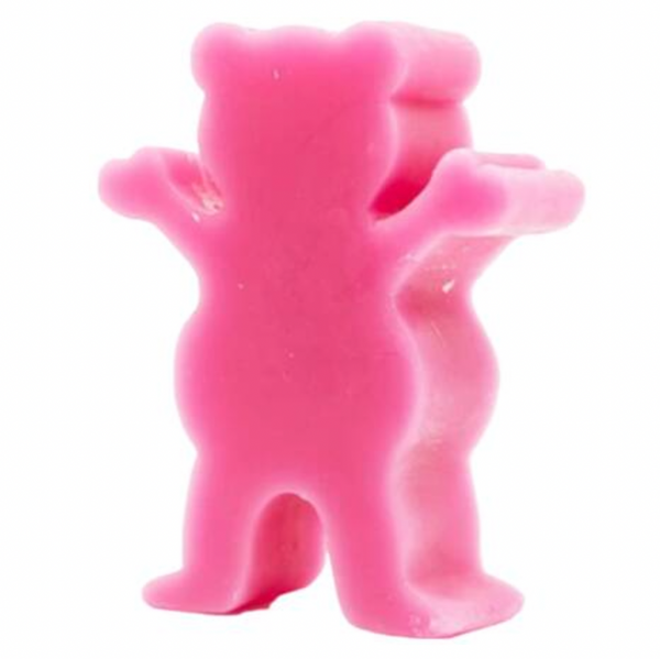 The GRIZZLY GREASE WAX PINK, a pink bear-shaped gummy candy that appears to be covered in a shiny layer of wax, stands upright and facing forward with both arms raised.