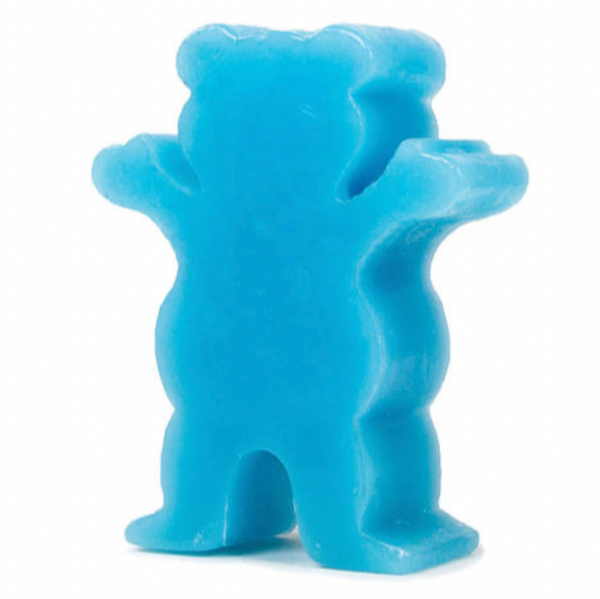 The GRIZZLY GREASE WAX BLUE crayon stands upright with raised arms, resembling a joyful little figure. Viewed from the front, its cheerful design adds charm to any art set.