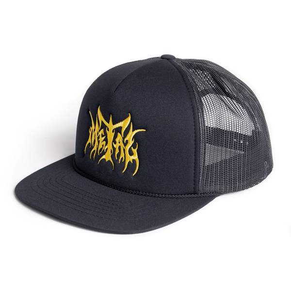 The METAL LOGO TRUCKER HAT BLACK by METAL features a striking yellow, stylized metal logo on the front panel of its black mesh design.