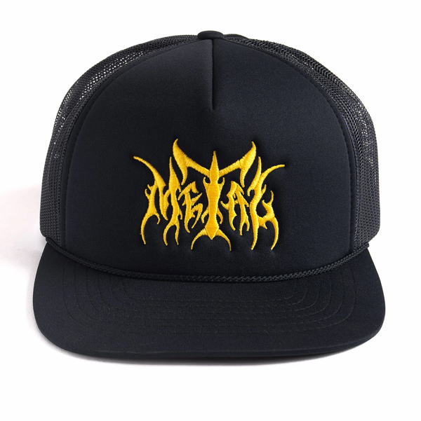 The METAL LOGO TRUCKER HAT BLACK by METAL features the word "metal" in yellow, styled like flames, on its front panel, with a mesh back.