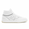 A white pair of NB Numeric 440 shoes on a white background.