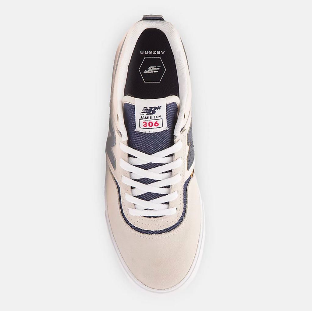 A pair of NB NUMERIC FOY 306 WHITE / NAVY sneakers on a white background.