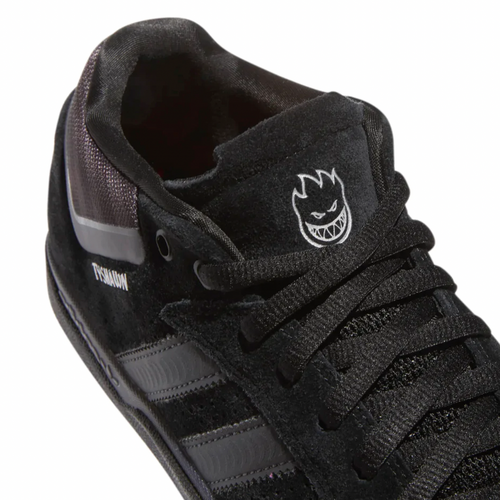 An ADIDAS TYSHAWN X SPITFIRE BLACK / BLACK / SILVER METALLIC shoe with a logo on it.