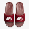 A pair of red Nike SB Victor One slides with a white Nike logo.