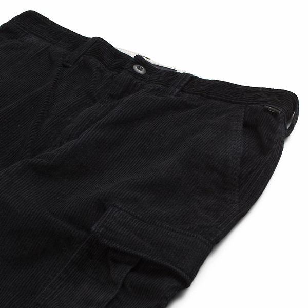 A pair of VANS Corduroy Loose Tapered Cargo Pant Black sitting on top of a white surface.