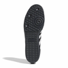 The sole of a black ADIDAS GINO SAMBA ADV RYR BLACK / WHITE shoe on a white background.