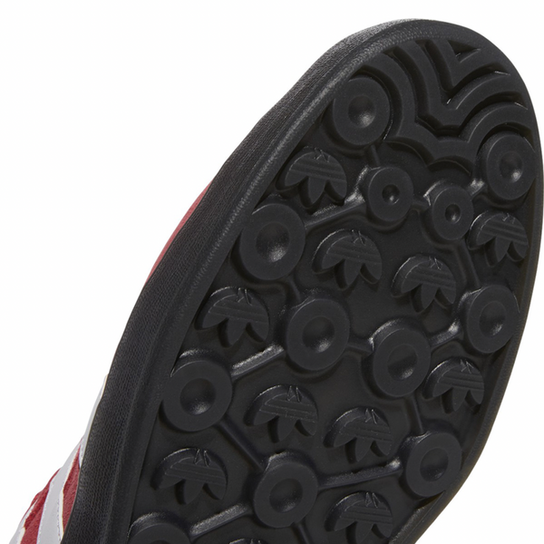 A pair of ADIDAS GONZ ALOHA SUPER "CHAIR FIGHT" SCARLET / WHITE shoes with black soles.