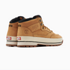 A pair of tan VANS SKATE X TIMBERLAND HALF CAB HIKER WHEAT boots on a white background.