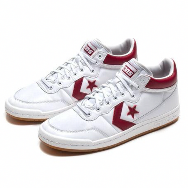 A Converse sneaker CONS FASTBREAK PRO in white, team red, and gum with a star on the side.