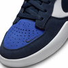 Featuring a vibrant color palette of Hyper Royal and Obsidian, the Nike Swoosh is prominently displayed on the iconic Nike SB Force 58 OBSIDIAN / WHITE / HYPER ROYAL sneakers.
