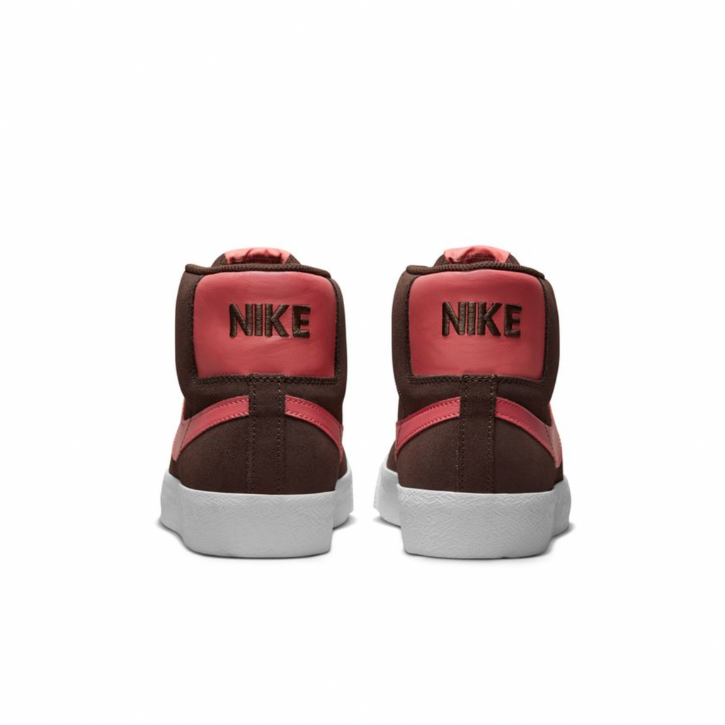 A pair of NIKE SB BLAZER MID BAROQUE BROWN / ADOBE / WHITE sneakers.