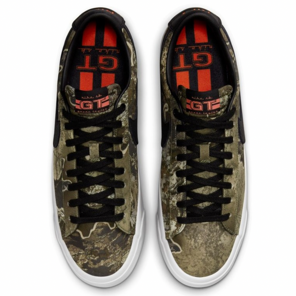 The Nike Blazer Low in camouflage, now available in the NIKE SB BLAZER LOW PRO GT BLACK / SAFETY ORANGE by nike.