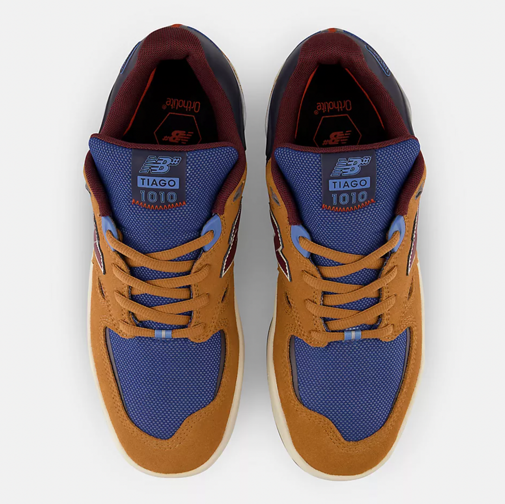 A pair of NB NUMERIC 1010 Tiago Brown/Blue sneakers on a white background.