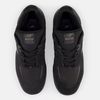 A pair of NB NUMERIC 1010 Tiago black/black sneakers with purple accents.