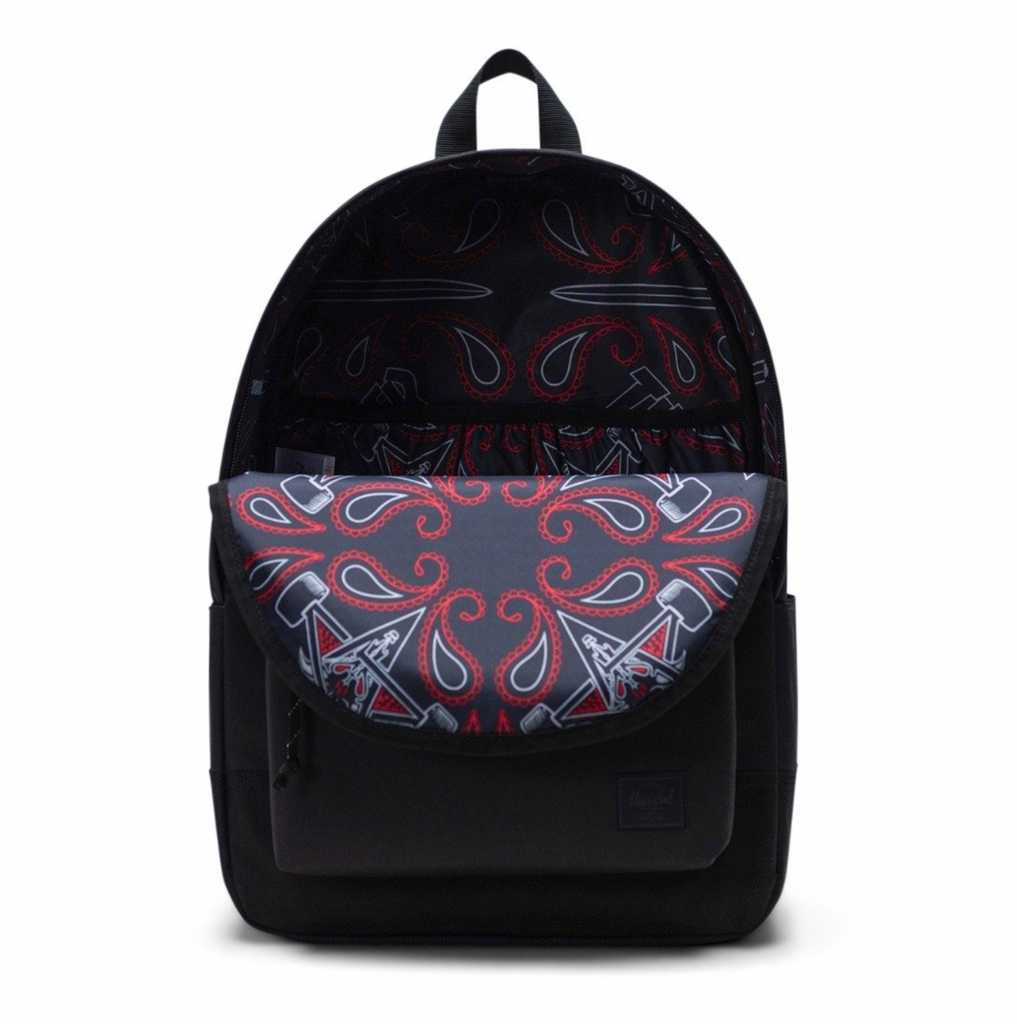 A HERSCHEL THRASHER X HERSCHEL CLASSIC XL BACKPACK BLACK with a red and white pattern.
