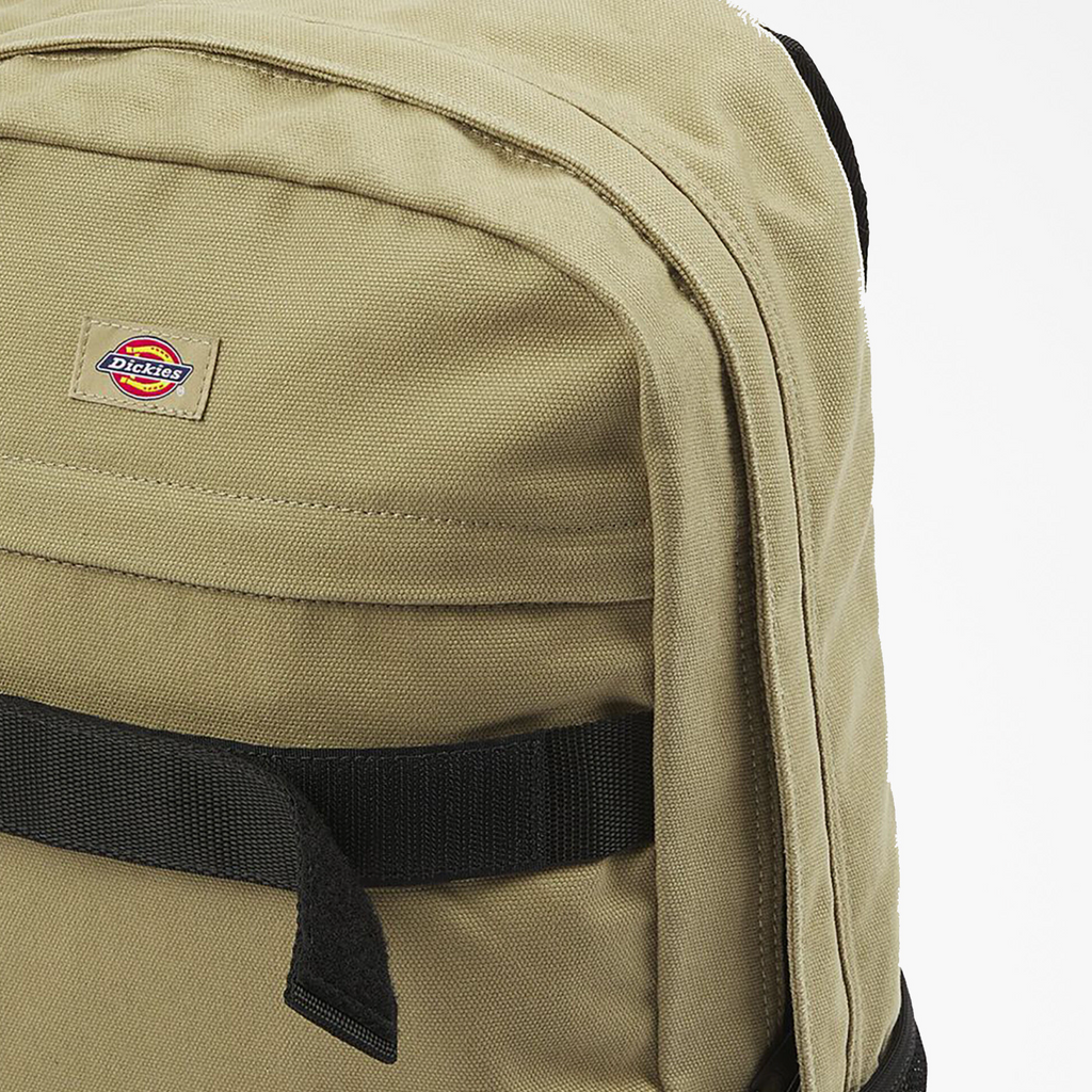 A close up of a Dickies Duck Canvas Backpack Desert Sand on a white background.