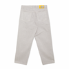 A pair of POLAR '93! DENIM PALE TAUPE pants with a yellow tag on the side.