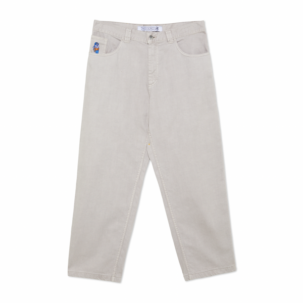A white pair of POLAR '93! DENIM PALE TAUPE jeans with a blue patch on the back.