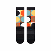A pair of STANCE SOCKS POKA POKA LARGE WASHED BLACK with colorful circles on them.