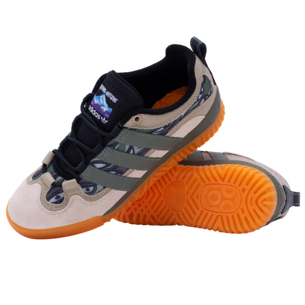 A pair of ADIDAS X FA EXPERIMENT 1 DUST SAND shoes with orange soles.