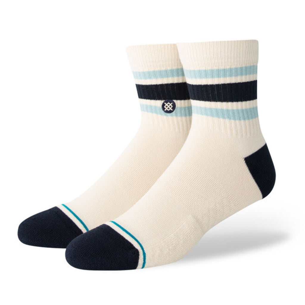 A pair of STANCE Boyd Quarter Vintage White Large socks with blue and white stripes.