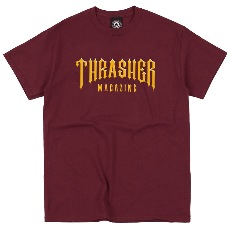 A THRASHER maroon t-shirt featuring the word "Thrasher" prominently.