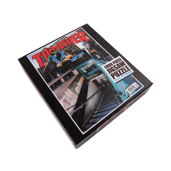 A box of the THRASHER TYSHAWN JONES PUZZLE, a 1000-piece jigsaw puzzle by Thrasher, featuring an image of Tyshawn Jones skateboarding on a city street.