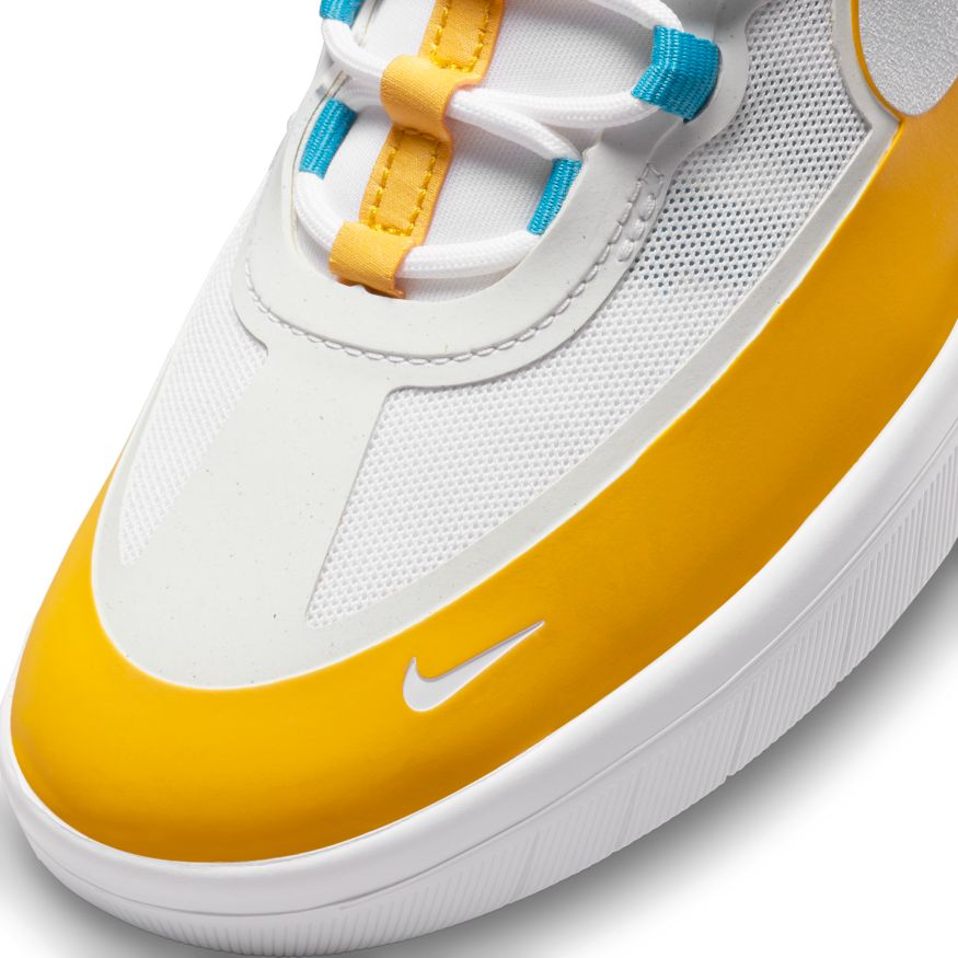The Nike SB Nyjah Free II Dark Sulfur/White-Laser Blue, with its white and yellow color scheme and blue accents, is a stylish sneaker perfect for skateboarders. For any inquiries or more information about the Nike SB collection, feel free to reach out.