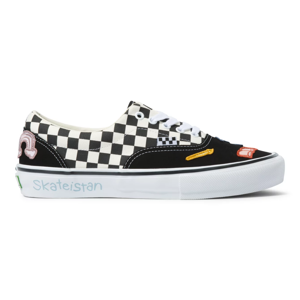 a checkered shoe with black paneling and small colorful patches