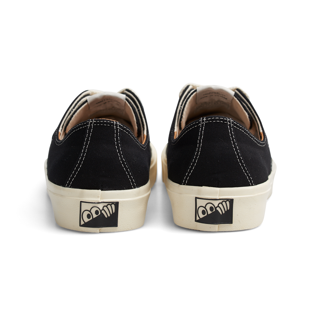 A pair of LAST RESORT AB X DANCER VM003 CANVAS BLACK sneakers with a white logo on the side.
