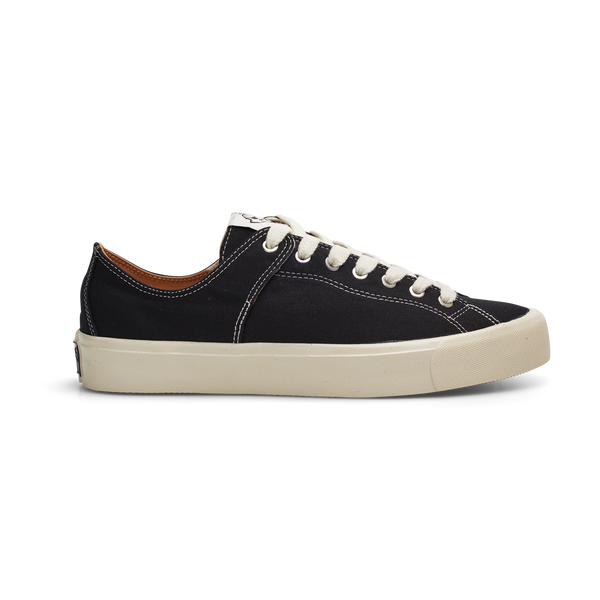 A black and white LAST RESORT AB X DANCER VM003 CANVAS sneaker with a white sole.