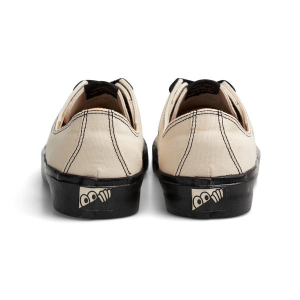 A pair of black and white Last Resort AB sneakers featuring a canvas upper with the iconic logo.