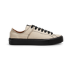 A white leather LAST RESORT AB X DANCER VM003 CANVAS WHITE sneaker with black soles.
