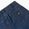 A close up of a pair of DICKIES JAKE HAYES DENIM STONEWASH VINTAGE BLUE jeans from DICKIES.